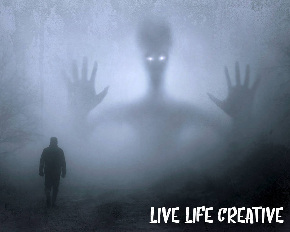 A man walks towards a ghostly figure on the Live Life Creative website